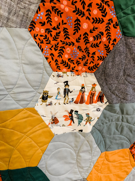 Alice in Wonderland Gray and Gold Baby Quilt - Quilts a la Mode