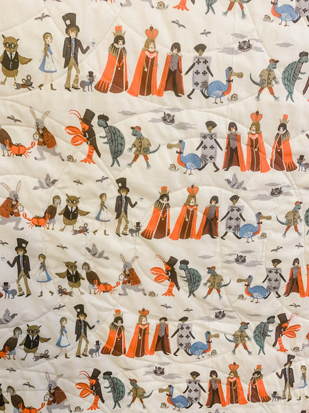 Alice in Wonderland Gray and Gold Baby Quilt - Quilts a la Mode