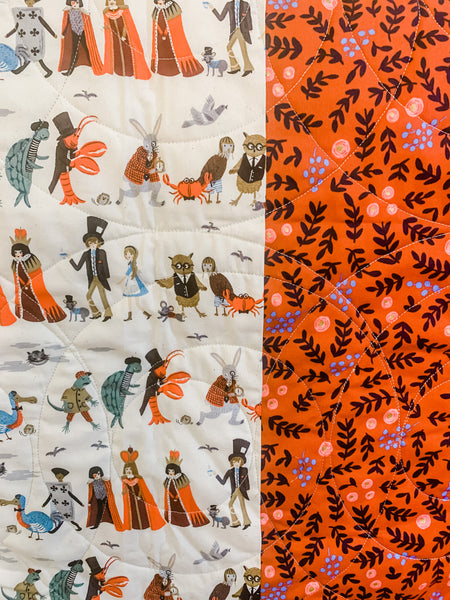 Alice in Wonderland Gray and Gold Baby Quilt - Quilts a la Mode