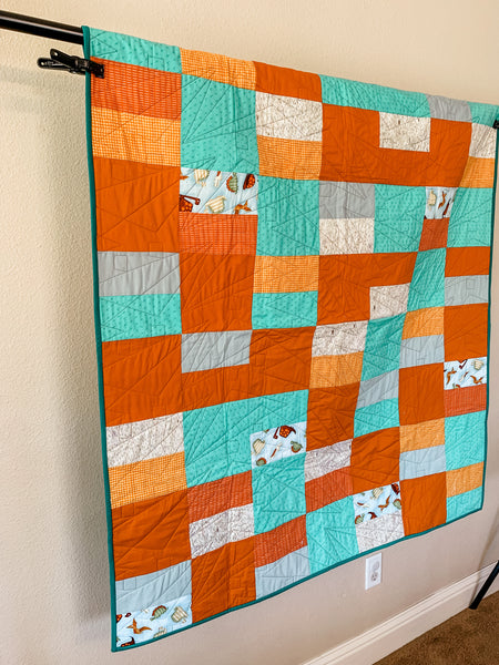 Green and orange dinosaur baby/crib quilt - Quilts a la Mode