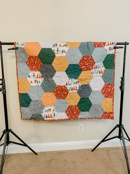 Alice in Wonderland Gray and Gold Baby Quilt - Quilts a la Mode