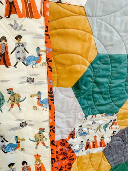 Alice in Wonderland Gray and Gold Baby Quilt - Quilts a la Mode